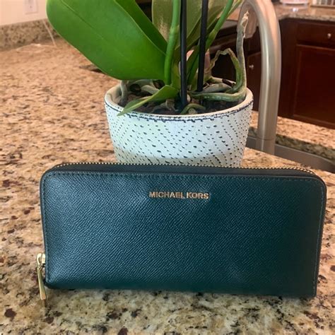 michael kors grommet wallet|Michael Kors racing green wallet.